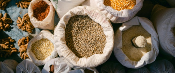 Paper-plastic composite bags for flour and sugar stacked on pallet